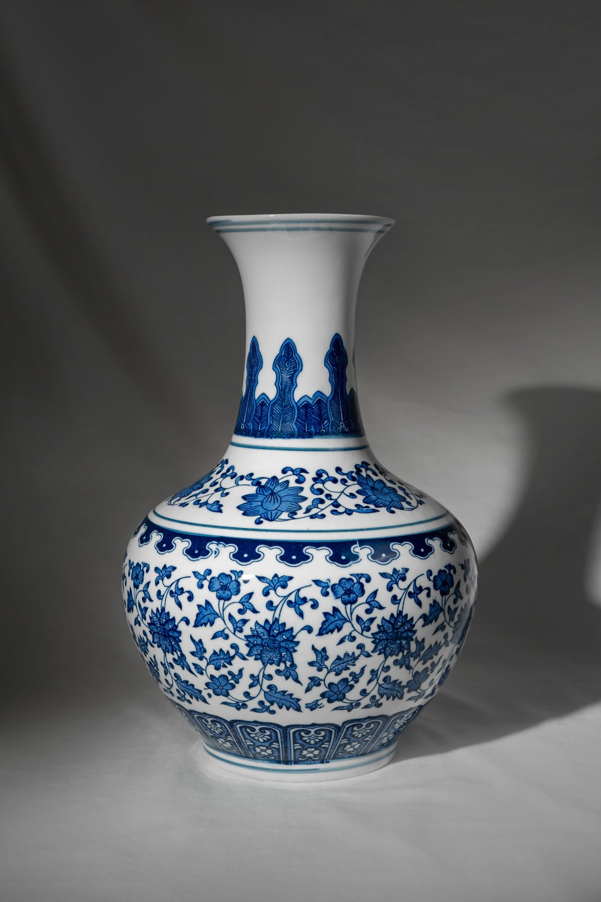 Royal Indigo Curved Porcelain Vase – 28 cm